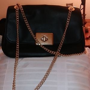 Brand new black an gold coach purse